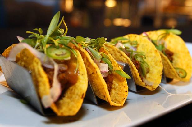 Chego tacos by chef Akira Back of the Yellowtail Restaurant and Lounge are displayed during the Vegas Uncork'd "Follow That Truck" food festival at the Bellagio Thursday May 20, 2012. Celebrity chefs added to the gourmet fare from more than a dozen food trucks for the festival outside under the lights at Bellagios Hidden Drive.