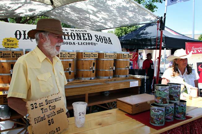 Jerry and Cindy Foote of Kanab, Utah, sell their old-fashioned sodas at the Art Festival of Henderson. Jerry said they have
to be wary of how far they travel for events because of gas prices and other costs that eat into their bottom line.