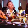 Students from Singapore Janice Sou, center, 23, and Cheryl Toh, right, 23, learn the basics of dining decorum during an etiquette dinner at the Stan Fulton Building at UNLV on Thursday, May 17, 2012.