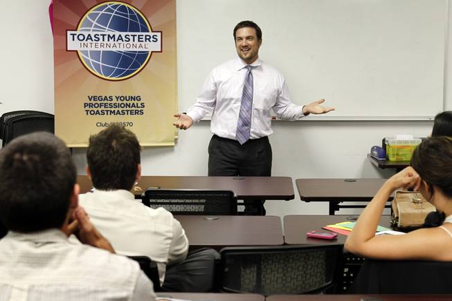 Cort Arlint, an attorney and accountant, gives an impromptu presentation as he fills in for another speaker during a meeting of the Vegas Young Professionals Toastmasters club in the Emergency Arts building downtown Monday, May 14, 2012. Toastmasters is an organization of clubs that encourage members to improve their public speaking and leadership skills.