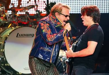 Van Halen frontman David Lee Roth, left, performs with guitarist Eddie Van Halen at the MGM Grand Garden Arena Sunday, May 27, 2012.