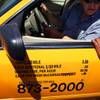 Taxicab Authority Police stop taxis at a long haul checkpoint near the entrance to the airport tunnel exiting McCarran International Airport in Las Vegas on Friday, June 8, 2012.