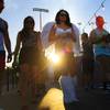 Festival goers arrive for the first evening of the Electric Daisy Carnival Friday, June 8, 2012 at the Las Vegas Motor Speedway.