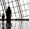 A family strolls in the E Gate area during an open house at the new Terminal 3 at McCarran International Airport in Las Vegas on Saturday, June 9, 2012.