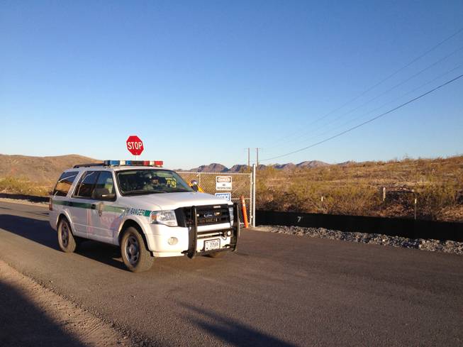 A Park Ranger vehicle is seen near the area for a tunnel accident occurred Monday, June 11, 2012, near Lake Mead.