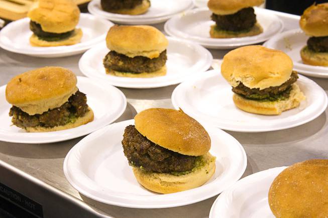 Italian pub burgers are displayed ConAgra Mills booth at the IFT Food Expo at the Las Vegas Convention Center, June 25, 2012. The burgers have Sustagrain Flakes in the meat and Ultragrain whole wheat flour in the bun for added fiber. New techniques have lead to whole wheat products that taste more like products made with white flour, a representative said.