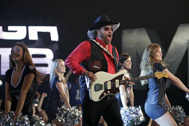 Hank Williams Jr. performs during the recording of a promo for NFL Monday Night Football in Winter Park, Fla., Thursday, July 14, 2011.  Williams recorded the promo despite the fact that the upcoming season still remains in limbo.
