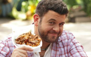 Adam Richman, host of the Travel Channel’s Man v. Food.