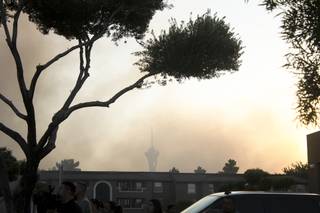 Smoke is seen from a nearby apartment fire on Karen Avenue near Maryland Parkway and Sahara Avenue, July 5, 2012. 