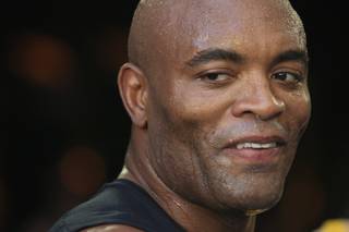 Middleweight champion Anderson Silva smiles during a news conference and media work out Thursday, July 5, 2012 in advance of UFC 148.