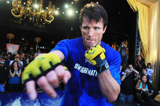 Chael Sonnen shadow boxes during a news conference and media work out Thursday, July 5, 2012 in advance of UFC 148.