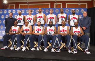 USA Basketball head coach Mike Krzyzewski, left, and USA Basketball Chairman Jerry Colangelo, right, flank the twelve players selected for the 2012 U.S. Olympic mens basketball team during a news conference at the Wynn Las Vegas Saturday, July 7, 2012.  Back row (L-R) Carmelo Anthony, Blake Griffin, Tyson Chandler, Kevin Love, Kevin Durant, and LeBron James. Front row (L-R) Chris Paul, Russell Westbrook, Deron Williams, James Harden, Andre Iguodala, and Kobe Bryant.