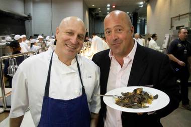 Tom Colicchio and Andrew Zimmern, pictured here at MGM Grand Garden Arena, in the 100th episode of Travel Channel’s “Bizarre Foods” filmed in Las Vegas. 