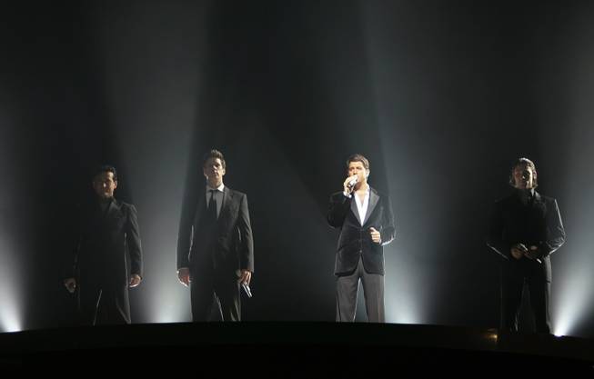The classical-pop group Il Divo with Carlos Marin of Spain, David Miller of the United States, Sebastien Izambard of France and Urs Buehler of Switzerland, from left to right, performs during a concert at the Hallenstadion in Zurich, Switzerland, Tuesday, June 12, 2007. 