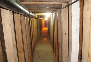 In this undated photo provided by the United States Drug Enforcement Administration, shows a 240-yard, a complete and fully operational tunnel that ran from a small business in Arizona to an ice plant on the Mexico side of the border, Thursday, July 12, 2012, in San Luis, Ariz.