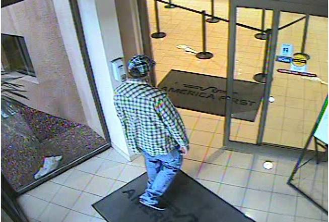 Henderson Police say this man robbed an America First Credit Union, 370 N. Stephanie St., on Friday and fled into a nearby apartment complex.