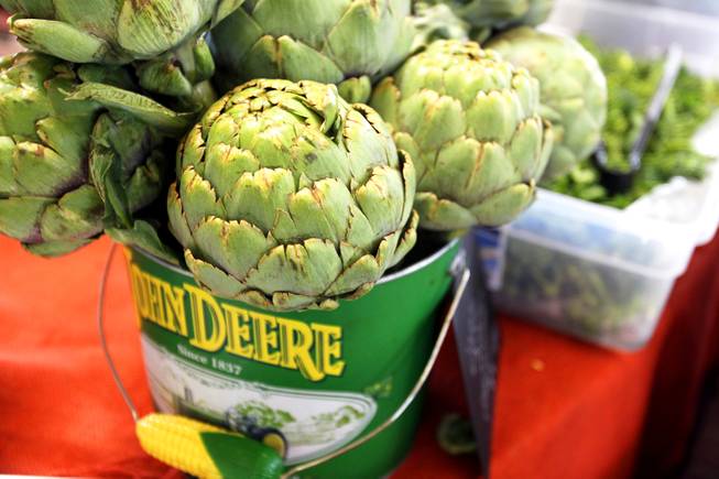 Large globe artichokes for sale from the Intuitive Forager at the Downtown Third Farmer's Market in Las Vegas on Friday, July 20, 2012.
