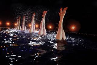 All of the former Olympians, Hiromi Kobayashi, Lila Neesseman-Bakir, Bianca Van der Velden, Kristina Lum Underwood and Isabel Moraes, in Le Reve  The Dream show are synchronized swimmers in the show.