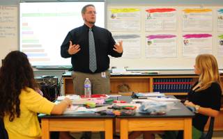 Williams Elementary School K-5 instructional coach Kris Huffman teaches math concepts using a 