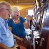 Slot player Babs Duncan celebrates with her husband Jack after picking the winning horse and winning $70 in bonus credits in a virtual horse race at the South Point Thursday, July 26, 2012. The South Point is the first casino in Nevada to implement the virtual race by Bally Technologies. Winners split a total prize pool of $30,000 in bonus credits.