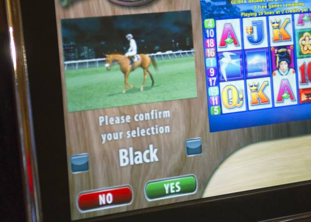 A screen asks for selection confirmation during a virtual horse race game at the South Point Thursday, July 26, 2012. The South Point is the first casino in Nevada to implement the Virtual Race by Bally Technologies. The black horse won and 107 people won $70 in bonus credits.