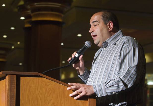 Track announcer Frank Mirahmadi calls a virtual horse race for slot players at the South Point Thursday, July 26, 2012. The South Point is the first casino in Nevada to implement the virtual horse racing game by Bally Technologies.