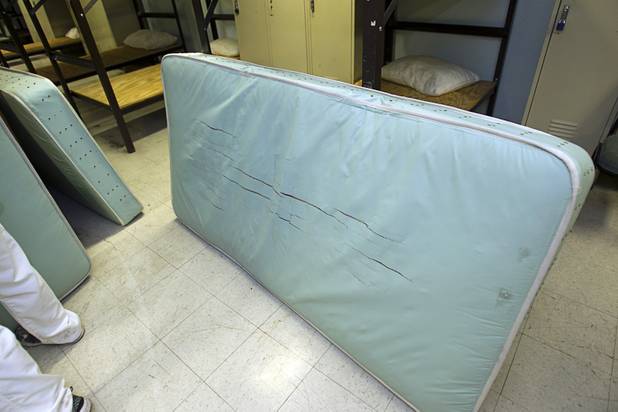 An old mattress is shown during a donation of 200 new mattresses at the Salvation Army Shelter on Owens Avenue Monday, July 30, 2012. The donation was the launch of Project Beds for America by World Bed. WorldBed, working with government and local charities, hopes to donate 2,000 anti-bacterial, bug-proof and water-proof mattresses to shelters around the Las Vegas Valley.