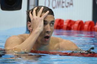 United States' Michael Phelps at the Aquatics Centre in the Olympic Park during the 2012 Summer Olympics in London, Monday, July 30, 2012. (AP Photo/Mark J. Terrill)