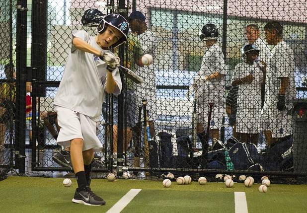 Cade Printy bats at the On Deck Baseball Academy Tuesday, July 31, 2012. For the first time in the leagues 18-year history, the Cheyenne Little League's 11-12 yr. old Majors division won the Nevada State Championship. The North Las Vegas team will now move on to the Little League Western Regionals in San Bernardino on August 3.