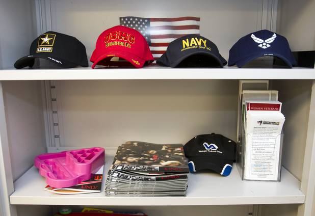 Caps with emblems of military service branches are displayed at the Office of Veteran Services at UNLV Tuesday, July 31, 2012. 