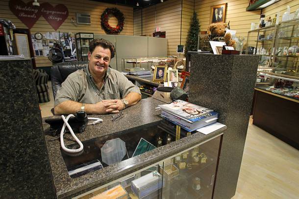 John Del Prado, CEO of Del Prado Jewelers, mans the shop at the Neonopolis mall in downtown Las Vegas Wednesday, August 1, 2012.  