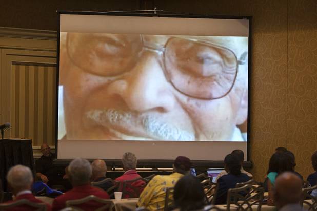 A video memorial to Tuskegee Airman Luke Weathers is shown during the International Black Aerospace Council convention at the Las Vegas Hotel Wednesday, August 1, 2012.  Weathers died Oct. 15, 2011 in Tucson, Ariz., at age 90.