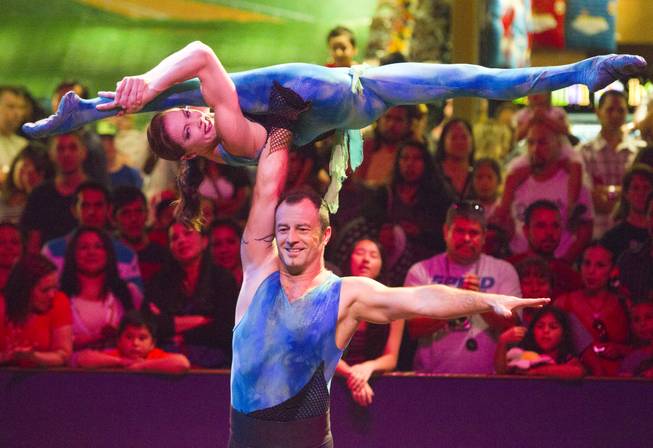 Magdalena Cyran and Tom Smiela of Poland, also known as the "Duo Joys," perform at the Midway at Circus Circus Thursday, August 2, 2012.