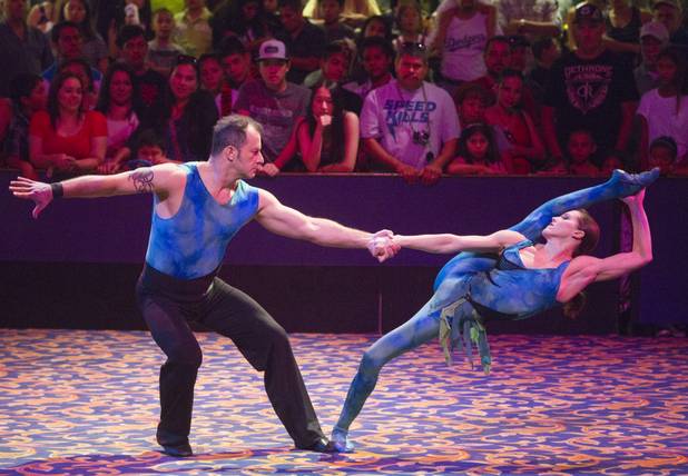 Magdalena Cyran and Tom Smiela of Poland, also known as the "Duo Joys," perform at the Midway at Circus Circus Thursday, August 2, 2012.