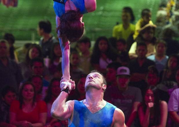 Magdalena Cyran and Tom Smiela of Poland, also known as the "Duo Joys," perform at the Midway at Circus Circus Thursday, August 2, 2012.