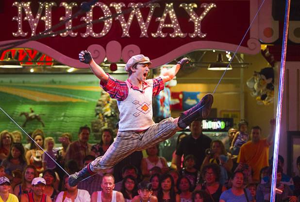 Slack wire artist Evgeny Vasilenko of Russia performs at the Midway at Circus Circus Thursday, August 2, 2012.