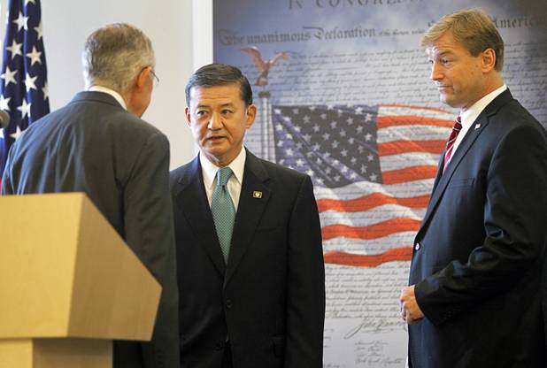 Secretary of Veterans Affairs Eric Shinseki, center, talks with Senate Majority Leader Harry Reid, left, and Senator Dean Heller before a dedication ceremony for the VA Southern Nevada Healthcare System Las Vegas Medical Center (VASNHS) in North Las Vegas Monday, August 6, 2012.
