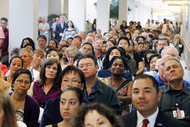 People listen to speakers during a dedication ceremony for the VA Southern Nevada Healthcare System Las Vegas Medical Center (VASNHS) in North Las Vegas Monday, August 6, 2012.