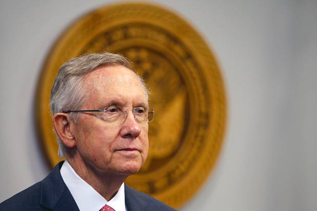 Senate Majority Leader Harry Reid waits to take questions from reporters after a dedication ceremony for the VA Southern Nevada Healthcare System Las Vegas Medical Center in North Las Vegas on Monday, Aug. 6, 2012.