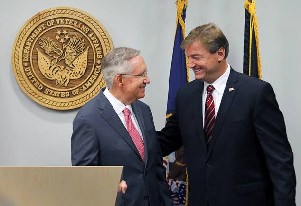 Senate Majority Leader Harry Reid, left talks with Sen. Dean Heller following a dedication ceremony for the VA Southern Nevada Healthcare System Las Vegas Medical Center (VASNHS) in North Las Vegas Monday, August 6, 2012.