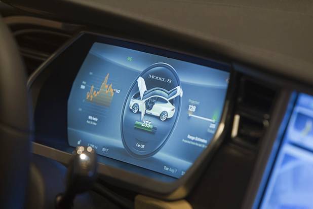 The interior of a Tesla S electric sedan is shown during the National Clean Energy Summit 5.0 at the Bellagio Tuesday, August 7, 2012. Depending on the battery the car can 0-60 mph in 4.4 second and has an estimated range of 300 miles at 55 mph.