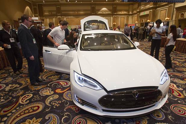 A Tesla S electric sedan is shown during the National Clean Energy Summit 5.0 at the Bellagio Tuesday, August 7, 2012. Depending on the battery the car can 0-60 mph in 4.4 second and has an estimated range of 300 miles at 55 mph.