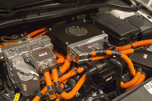 The engine bay of an electric Volkswagen E-Golf is displayed during the National Clean Energy Summit 5.0 at the Bellagio Tuesday, August 7, 2012.