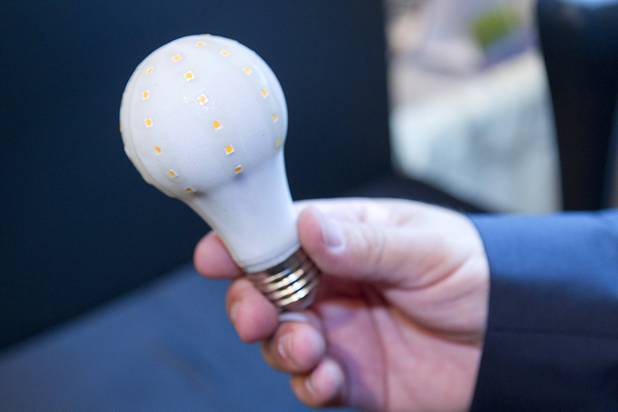 Inventor Dan Lang holds a BrightSol DLite LED bulb during the National Clean Energy Summit 5.0 at the Bellagio Tuesday, August 7, 2012. The DLite bulbs gives off the same amount of light as a 60 watt incandescent bulb but use only 9.5 watts and have an expected lifetime of 1 million hours. The bulbs should be available in stores by the end of the year and cost less than $15.00.