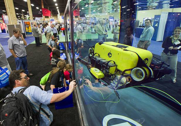 A Bluefin Robotics ship hull and infrastructure inspection drone is demonstrated in a water tank during the Association for Unmanned Vehicles Systems International (AUVSI) convention at the Mandalay Bay Thursday, Aug. 9, 2012.