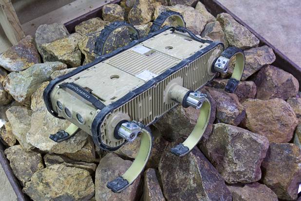 An RHex bot is displayed at the Boston Dynamics booth during the Association for Unmanned Vehicles Systems International (AUVSI) convention at the Mandalay Bay Thursday, Aug. 9, 2012. The reconnaissance robots are designed to move like cockroaches.