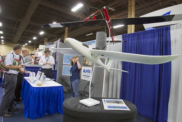 Planes with Applewhite Aero autopilot systems are displayed during the Association for Unmanned Vehicles Systems International (AUVSI) convention at the Mandalay Bay Thursday, Aug. 9, 2012. The autopilot system has the potential to turn low-cost hobby planes into simple drones that can be used for basic research.