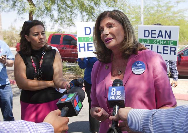 U.S. Congresswoman Shelley Berkley, D-Nev., holds a news conference in the Palo Verde High School parking lot before a rally for Republican vice presidential candidate Paul Ryan at the school Tuesday, Aug. 14, 2012. Berkley is running for U.S. Senate against Sen. Dean Heller, R-Nev.