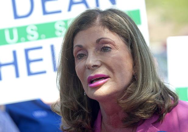 U.S. Congresswoman Shelley Berkley (D-NV) speaks during a  news conference in the parking lot of Palo Verde High School before a rally for Republican vice presidential candidate Paul Ryan at the school Tuesday, Aug. 14, 2012. Berkley is running for U.S. Senate against Sen. Dean Heller (R-NV).