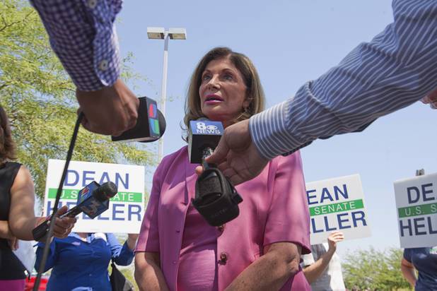 U.S. Congresswoman Shelley Berkley, D-Nev., holds a news conference in the Palo Verde High School parking lot before a rally for Republican vice presidential candidate Paul Ryan at the school Tuesday, Aug. 14, 2012. Berkley is running for U.S. Senate against Sen. Dean Heller, R-Nev.